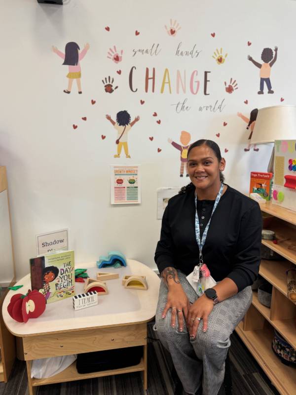Para-educator student sitting in a classroom