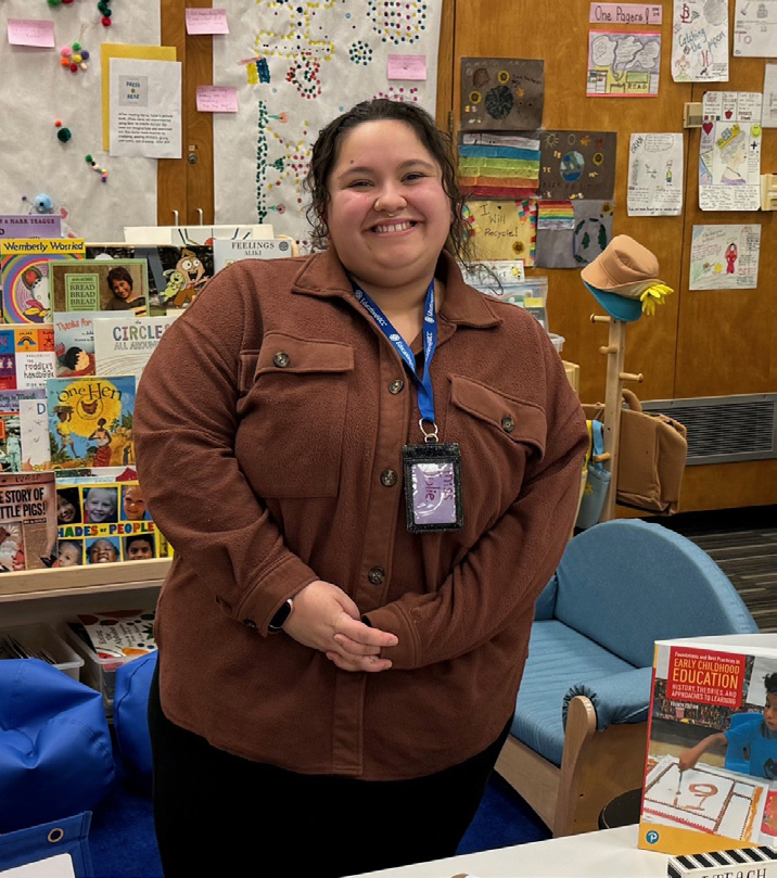 Para-educator training student in a classroom