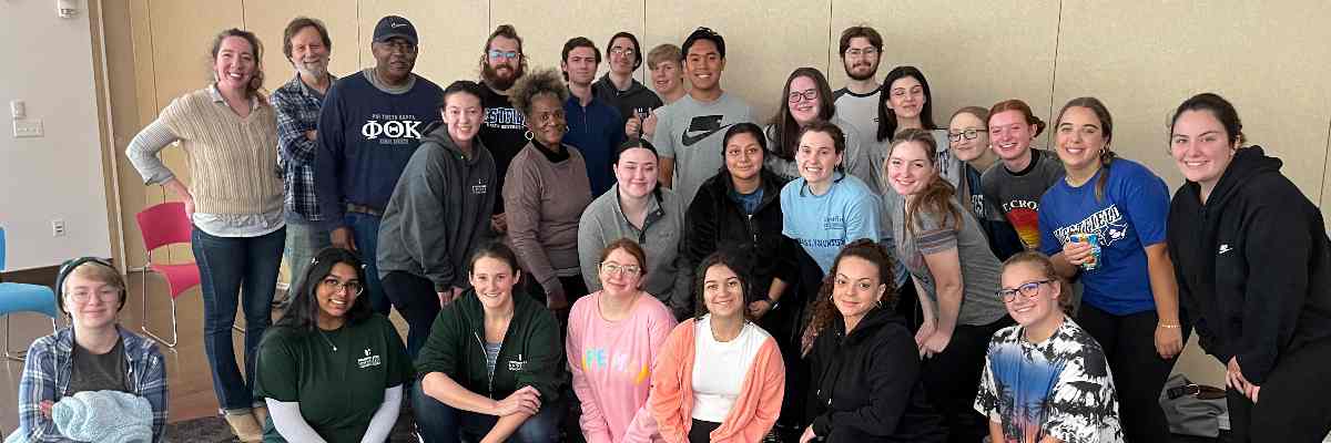 BCC honors student at a food packing event