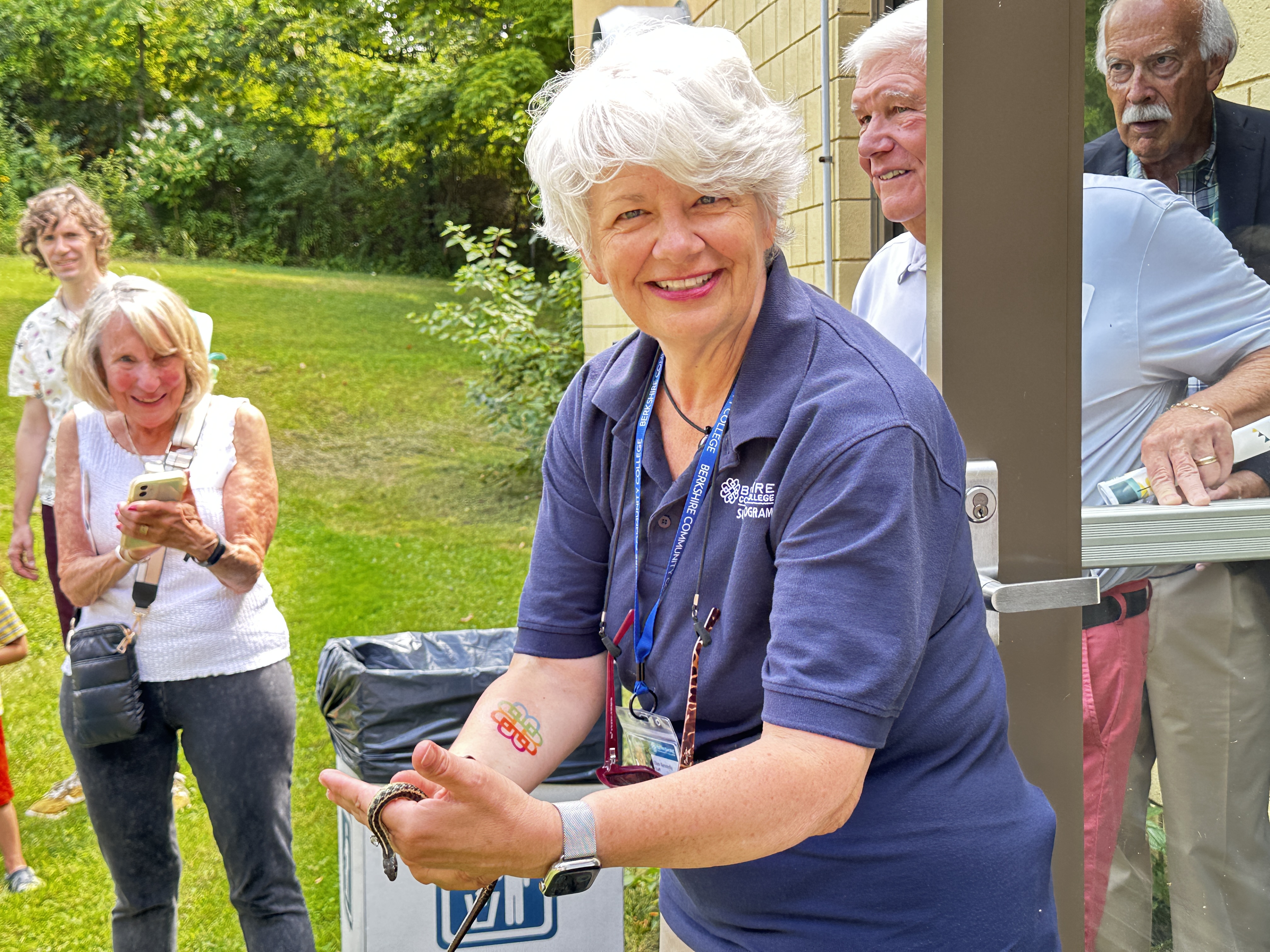 BCC president Ellen Kennedy holding a snake 